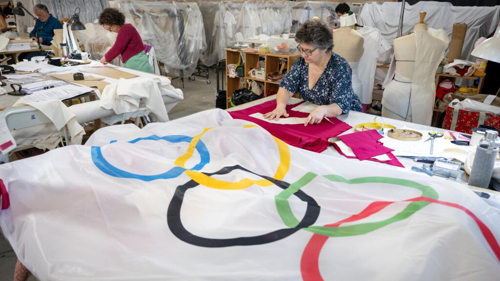 Hundreds of dressmakers race to complete Olympics costumes ahead of Games