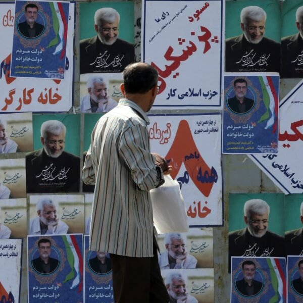 Khamenei protege, sole moderate neck and neck
