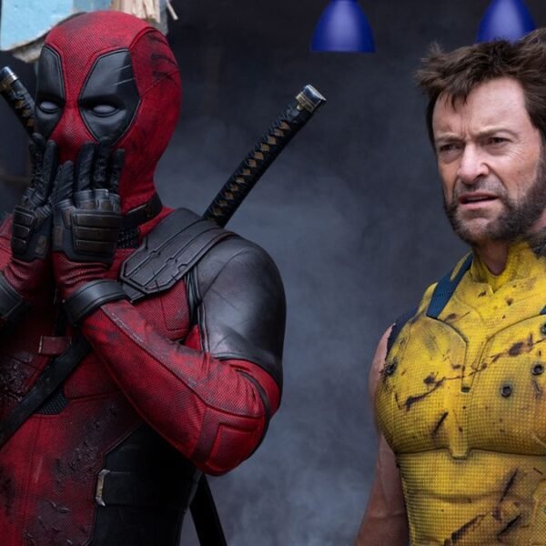 Deadpool (Ryan Reynolds) looking shocked standing next to Wolverine (Hugh Jackman) in Deadpool & Wolverine