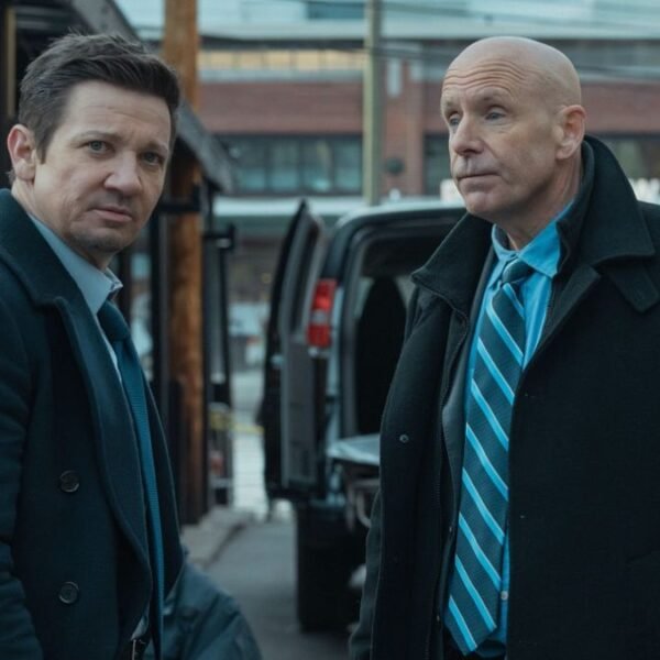L-R: Jeremy Renner as Mike McLusky and Hugh Dillon as Ian Ferguson in episode 5, season 3 of Mayor of Kingstown streaming on Paramount+, 2024.