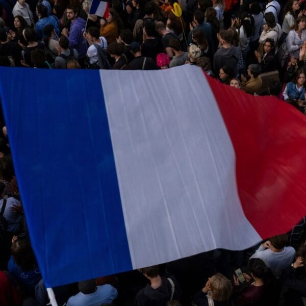 People gather at Republique plaza in a protest following results in the first round of France's elections. Pic: AP
