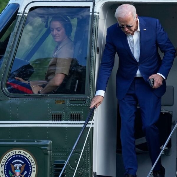 President Joe Biden walks off of Marine One on Sunday, 7 July. Pic: AP/Susan Walsh